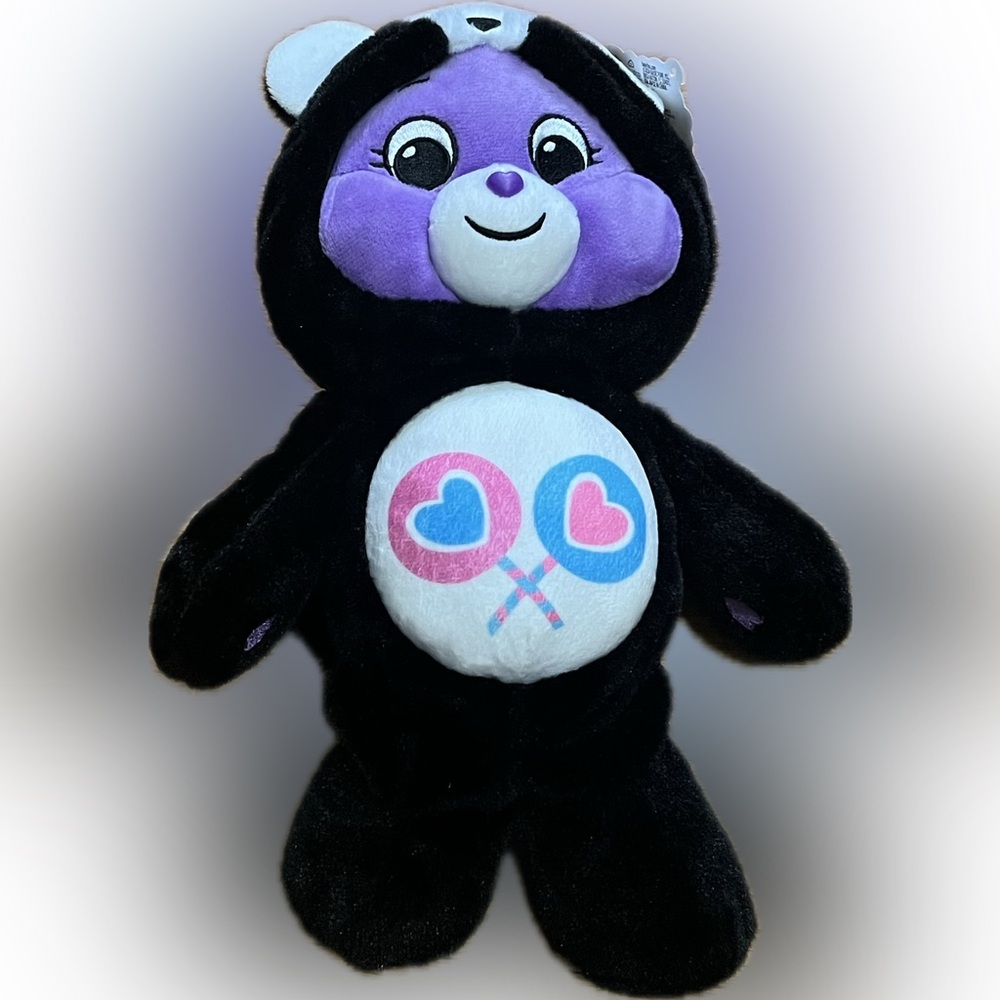 Care Bears Share Bear dressed as a skunk